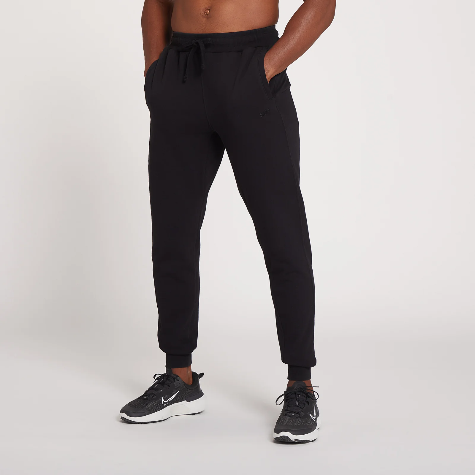 MP Meeste Dynamic Training jooksupüksid - tuhm must - XXS Pilt 1